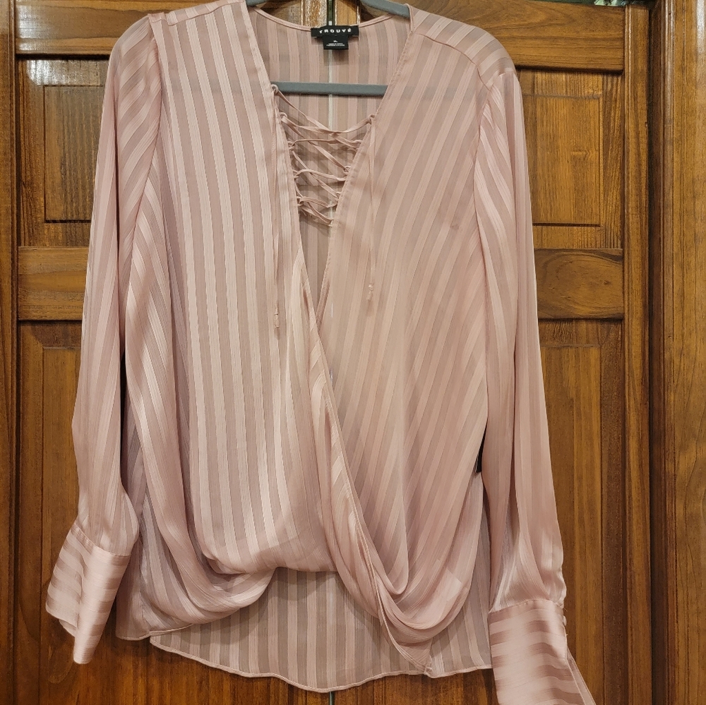 This lovely pink blouse, in a size X-large.